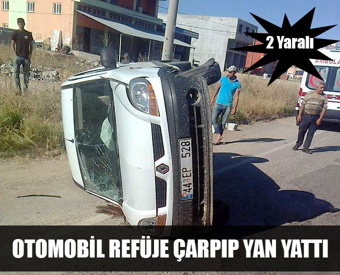 Otomobil Refüje Çarpıp Yan Yattı: 2 Yaralı