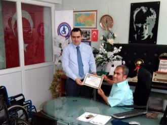 Kaymakamlıktan Anadolu Sakatlar Derneği Başkanına Şükran Belgesi