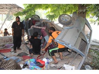 Bu Otomobilden 9 Kişi Sağ Çıktı !