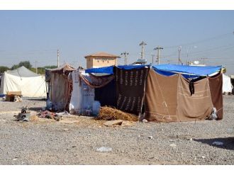 Ülkelerine Dönemeyen Mülteciler Tır Garajında Bekliyor