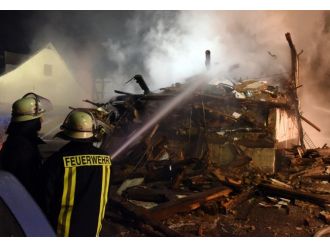 Göçmenlerin kaldığı binada yangın: 12 yaralı