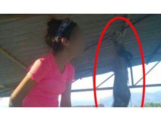 Kediyi iple asıp yanında fotoğraf çektirdi