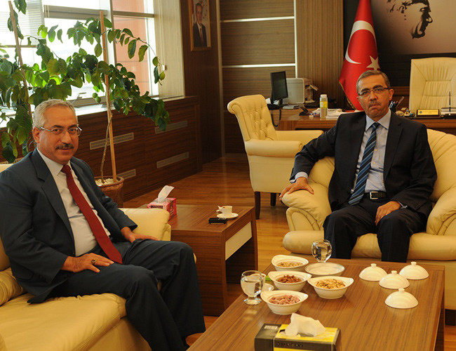 Deveci 7 Aralık Üniversitesi Rektörü Güvenç’i Ziyaret Etti