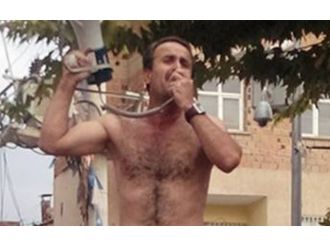 Milletvekili adayı tepkisini soyunarak gösterdi