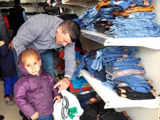 Suriyeli iş adamından yetimlere yardım