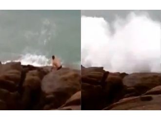 Dev dalga kayalıklardaki adamı böyle yuttu