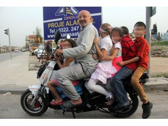 Bir motosiklete 6 kişi bindiler