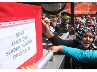 Şehidin eşi: Açın bakın, o değildir