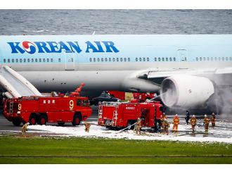 Uçakta yangın: 7 yaralı