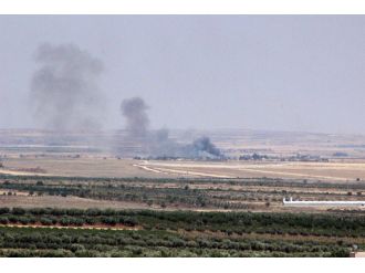 IŞİD’i karadan obüs topları, havadan uçaklar vuruyor