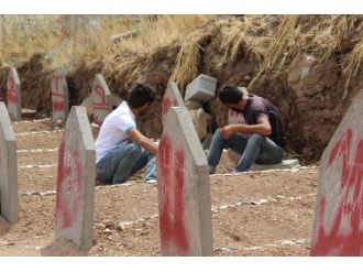 Katliam köyünde buruk Babalar Günü