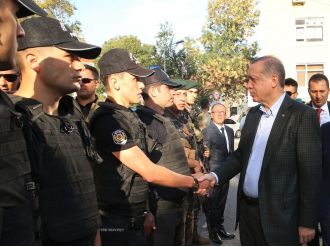 Erdoğan’dan polis merkezine ziyaret
