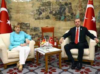Erdoğan Merkel’le görüştü