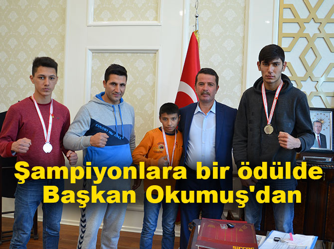 Şampiyonlara bir ödülde Başkan Okumuş'dan