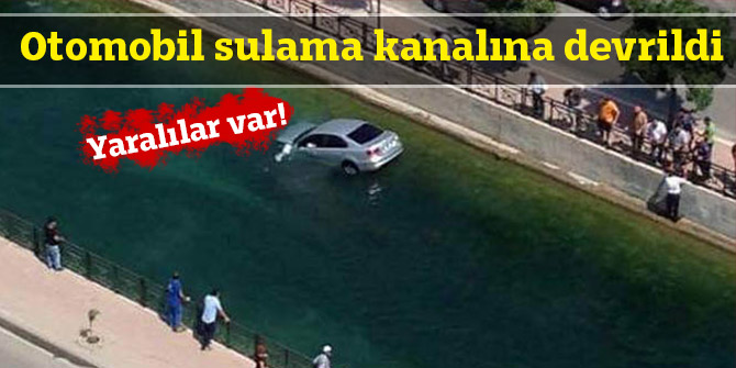 Otomobil sulama kanalına devrildi; yaralılar var