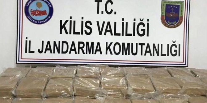 TIRIN GİZLİ BÖLMELERİNDEN 102 KİLO EROİN ÇIKTI