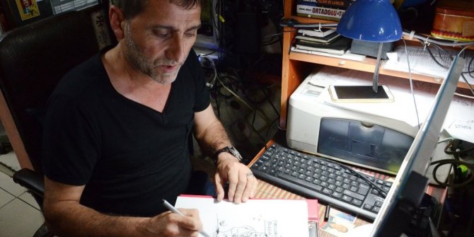 ŞEHRİNİN SORUNLARINI KARİKATÜRLE ANLAYIYOR