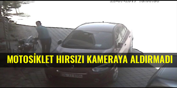 MOTOSİKLET HIRSIZI KAMERAYA ALDIRMADI