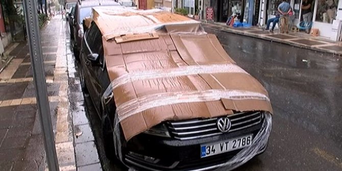 VATANDAŞLAR ARAÇLARIN ÜZERİNİ KİLİM VE KARTONLARLA ÖRTTÜ