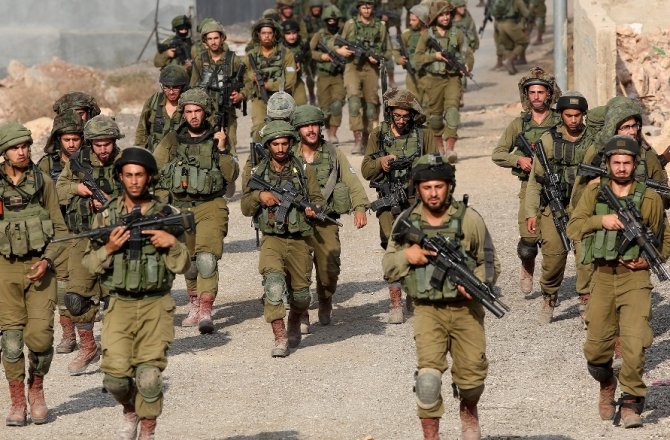 İSRAİL İŞGAL GÜÇLERİ 16 FİLİSTİNLİYİ GÖZALTINA ALDI