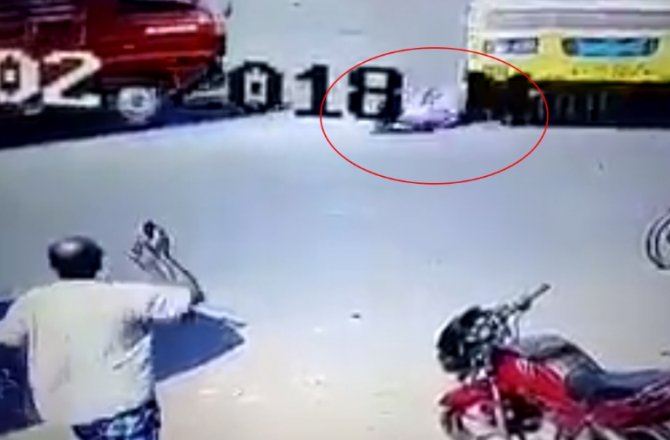 KAMYONUN ALTINDA FECİ ÖLÜM