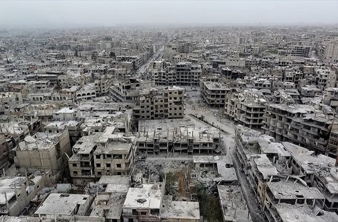 AA DOĞU GUTA'YI ZORUNLU TAHLİYELER SIRASINDA HAVADAN GÖRÜNTÜLEDİ