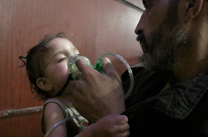 AB: SURİYE'DE İŞLENEN SAVAŞ SUÇLARININ HESABI VERİLMELİ