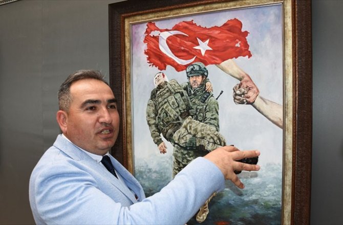 MUĞLA'DA POLİS MEMURUNDAN ŞEHİT AİLELERİ YARARINA RESİM SERGİSİ