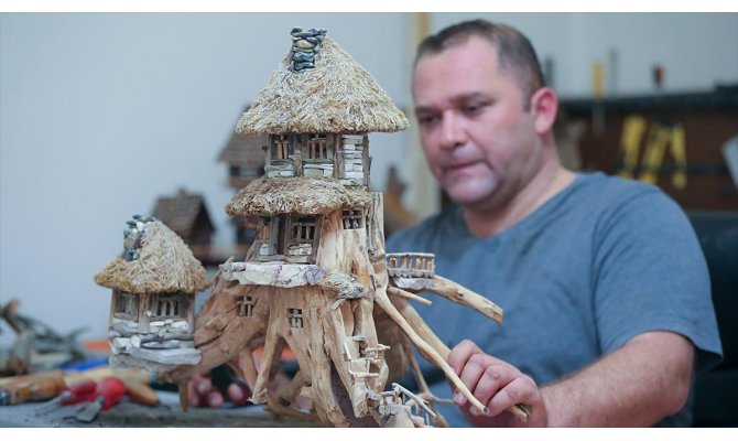 İşte 'beton binalar', evde 'ahşap maketler' yapıyor