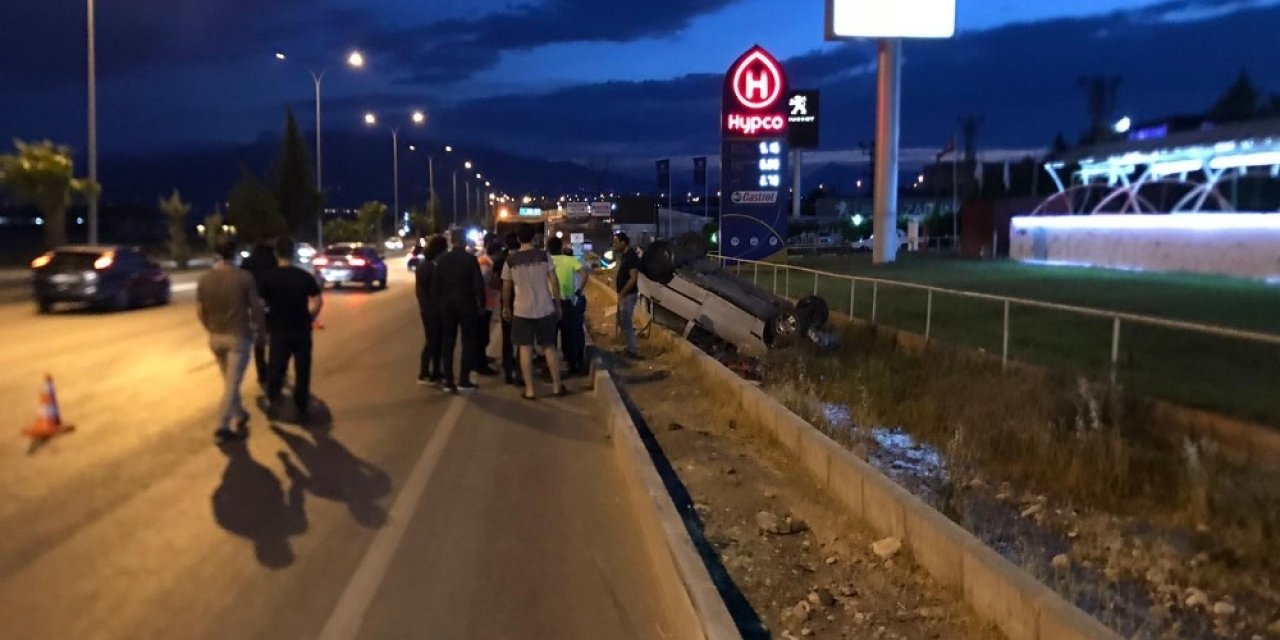 Takla atan otomobilden yara almadan kurtuldu