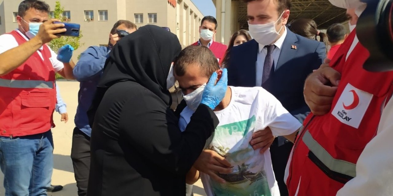Kahramanmaraş'ta kaybolan ve Suriye'de bulunan genç annesine kavuştu