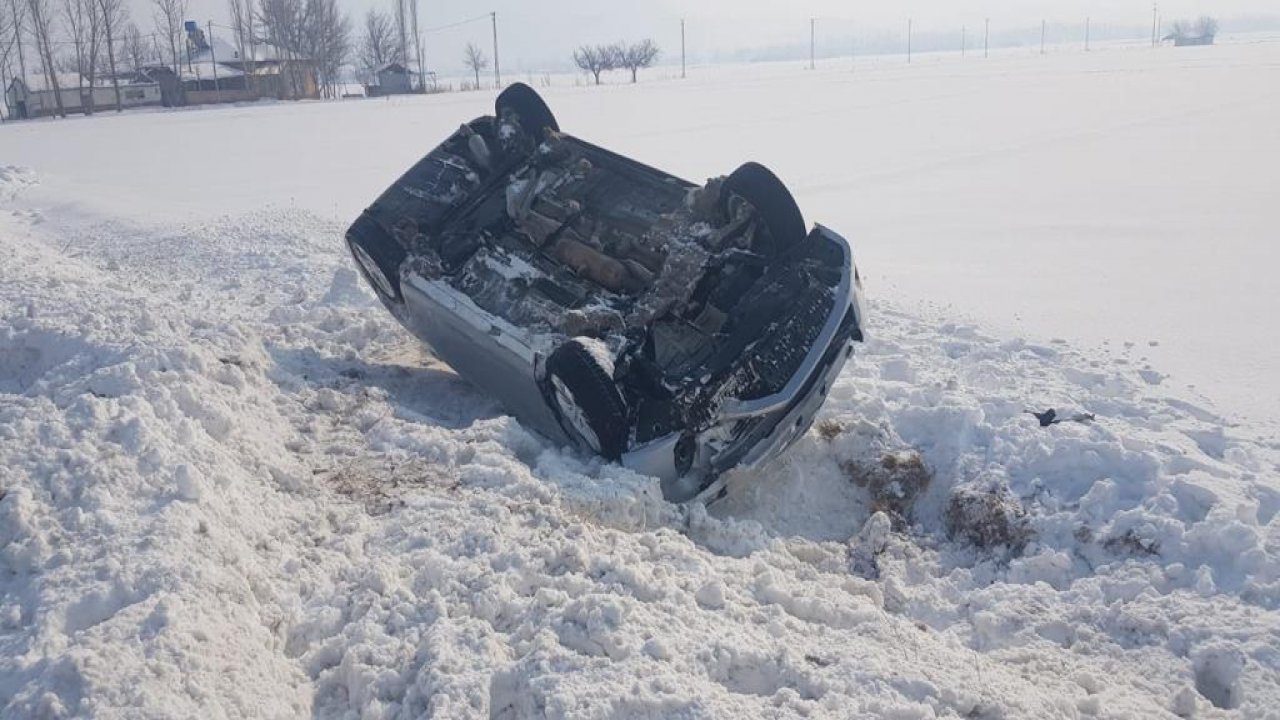 Buzlu yolda kontrolden çıkan otomobil takla attı