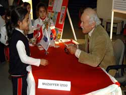 Yazar Muzaffer İzgü Sankoda