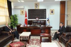 Vali den Başkan Poyraza  ziyaret