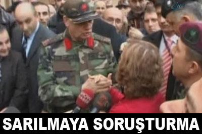 Başbuğa sarılan tapu memurundan savunması istendi 