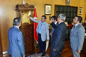 Başkan Poyraz’a Teksas Rozeti