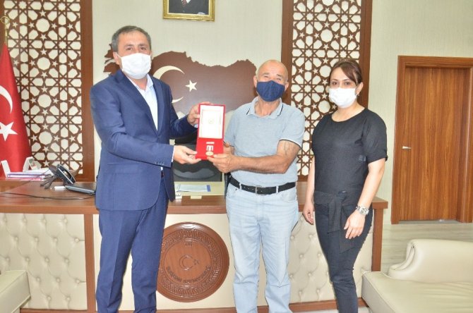 Kıbrıs gazisine madalya ve beratı takdim edildi